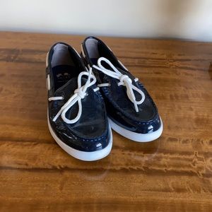 Navy patent Cole Haan slip on boat shoe